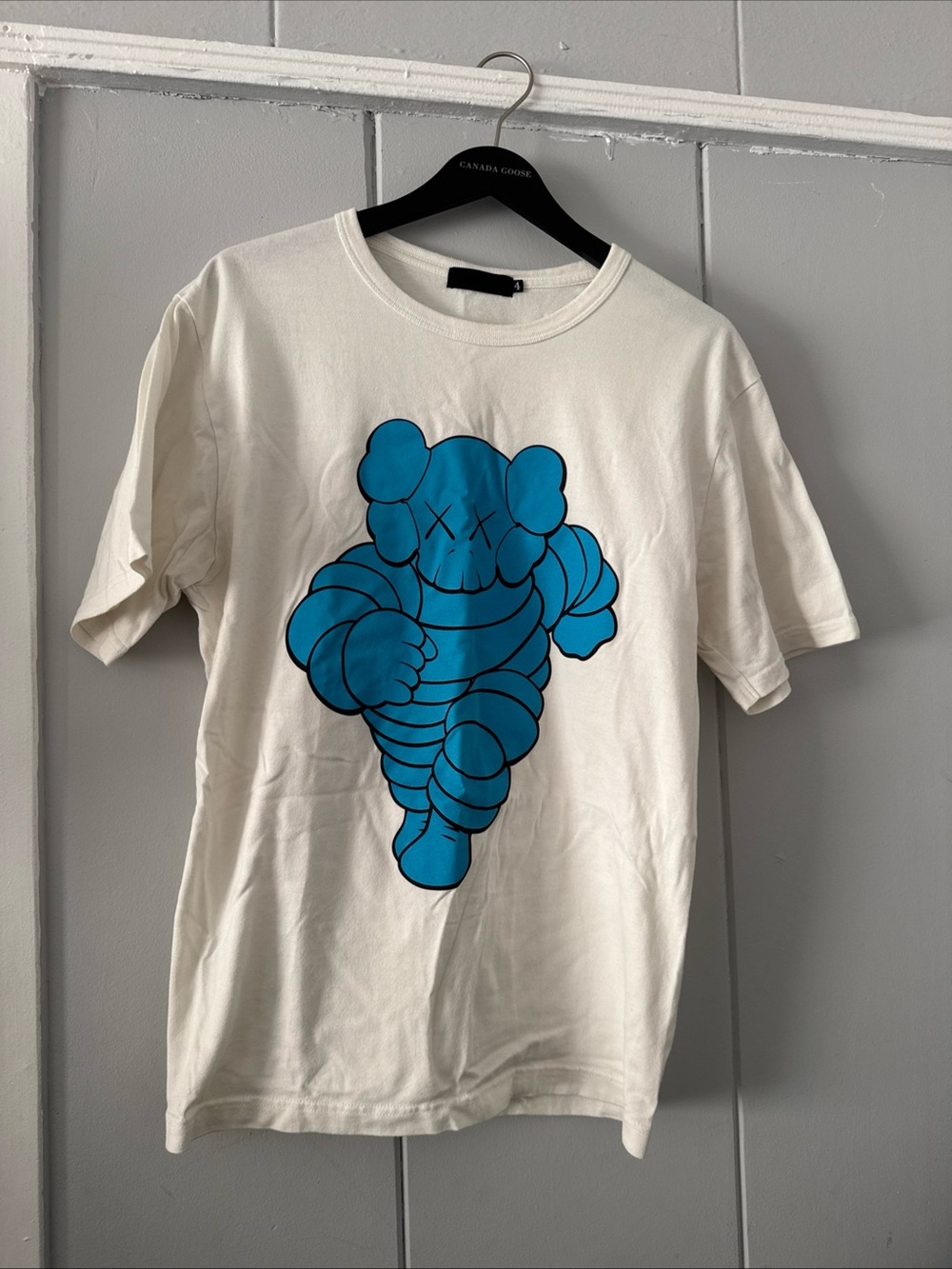 Cream Short-Sleeve Graphic Tee with Blue Character Print